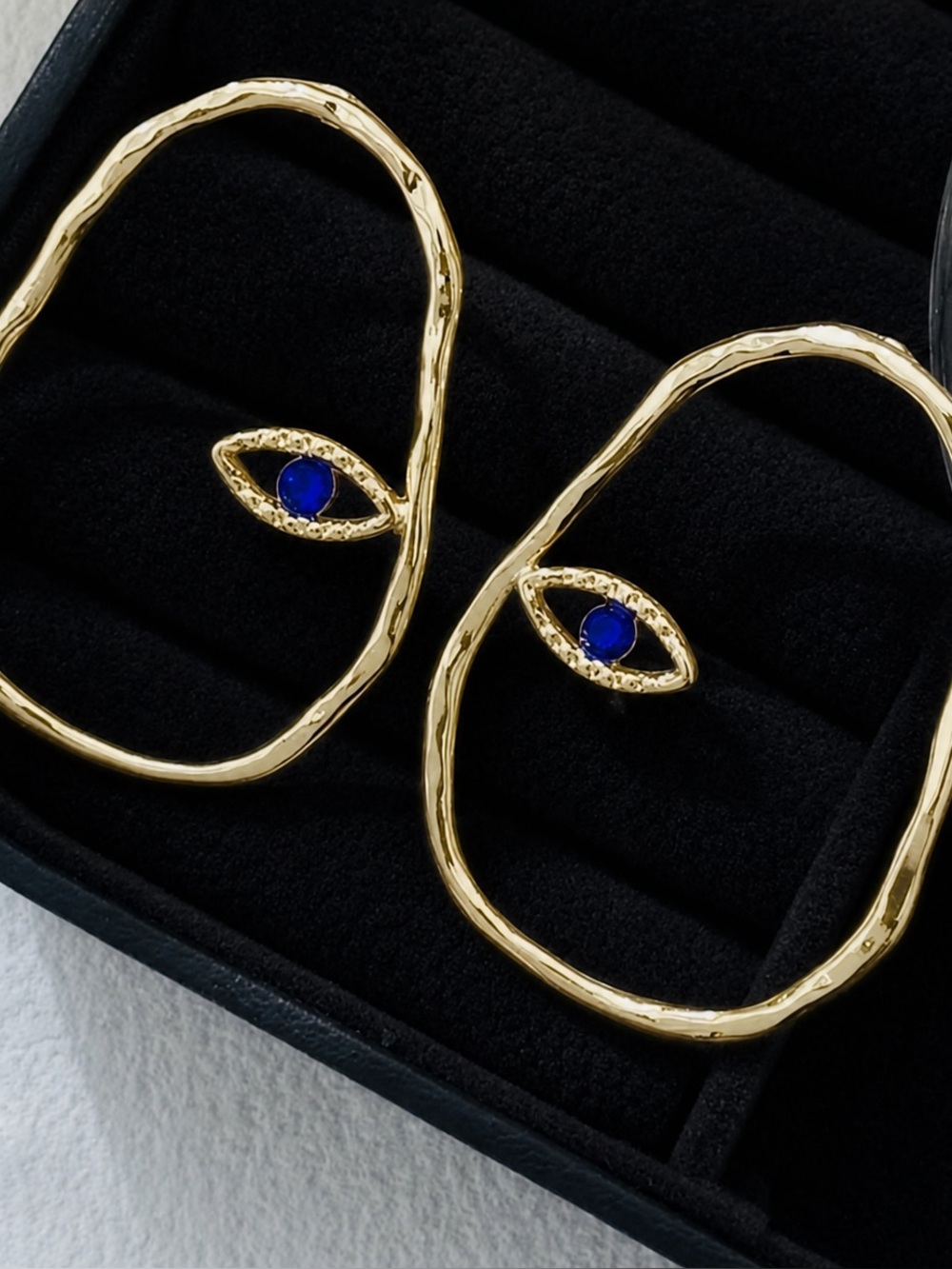 NWT Stamped Gold tone oval earrings with subtle Evil eye Earrings